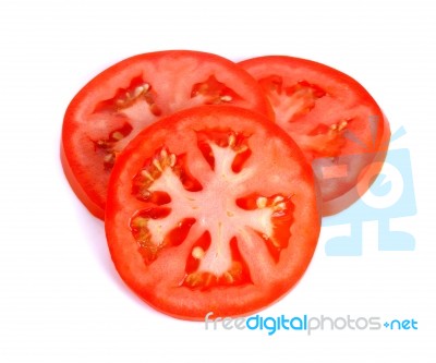 Slice Tomato Isolated On The White Background Stock Photo