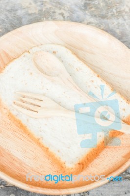 Sliced Of Whole Wheat Bread On Wooden Plate Stock Photo