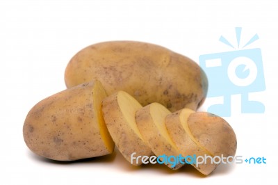 Sliced Potato And Whole Isolated On A White Background Stock Photo