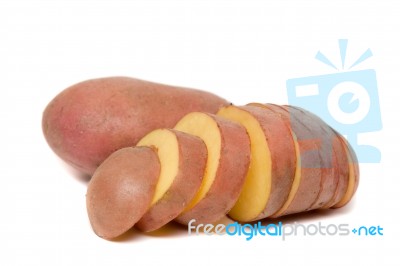 Sliced Potato And Whole Isolated On A White Background Stock Photo