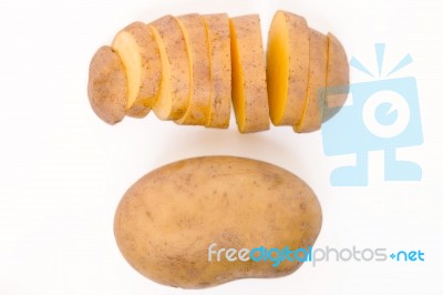 Sliced Potato And Whole Isolated On A White Background Stock Photo