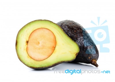 Sliced Ripe Avocado Isolated On White Background Stock Photo