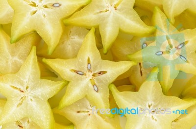 Sliced Star Apple On White Background Stock Photo