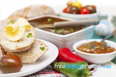 Slices Of Bread And Butter With Tomatoes, Peppers, Chutney And P… Stock Photo