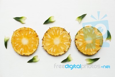 Slices Of Pineapple Isolated On White Stock Photo