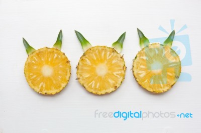 Slices Of Pineapple Isolated On White Stock Photo