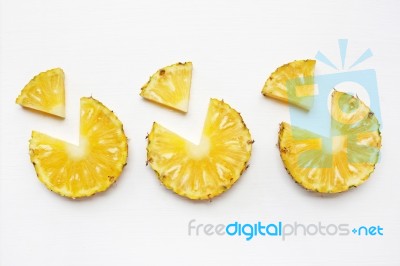 Slices Of Pineapple Isolated On White Background Stock Photo