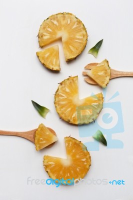 Slices Of Pineapple With Leaf Isolated Stock Photo