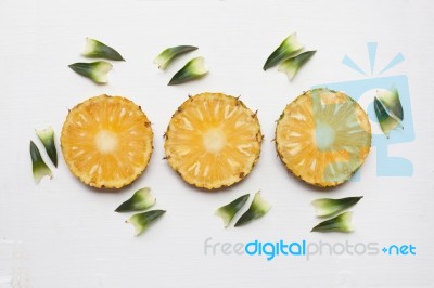 Slices Of Pineapple With Leaf Isolated Stock Photo