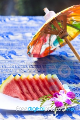 Slices Of Watermelon Served On Plate At Asian Restaurant Stock Photo