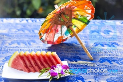 Slices Of Watermelon Served On Plate At Asian Restaurant Stock Photo