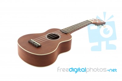 Small Guitar (ukulele) Focus Body On White Background Stock Photo