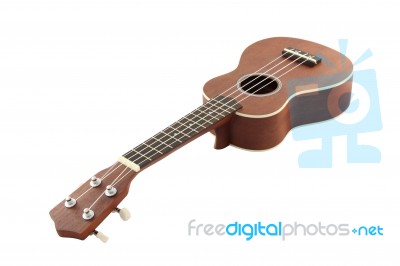 Small Guitar (ukulele) Focus Neck On White Background Stock Photo