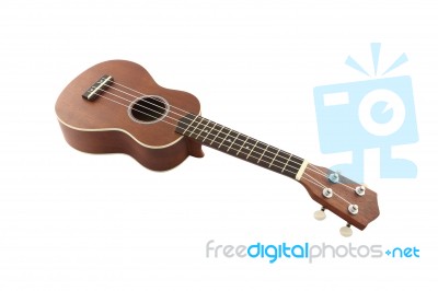 Small Guitar (ukulele) On White Background Stock Photo