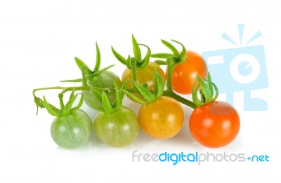 Small Tomato Isolated On The White Background Stock Photo