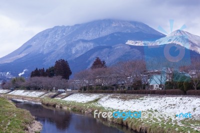 Small Village With Mountain And River Stock Photo