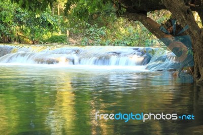 Small Water Fall In Forest Stock Photo