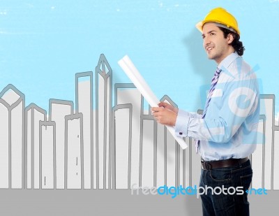 Smart Architect Holding Blueprint Map Stock Photo