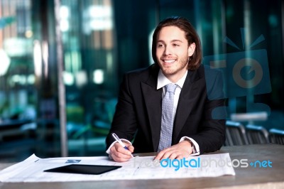 Smart Businessman Projecting His Plans Stock Photo