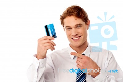 Smart Businessman Showing Credit Card Stock Photo