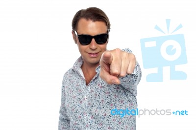 Smart Looking Man Pointing At The Camera Stock Photo