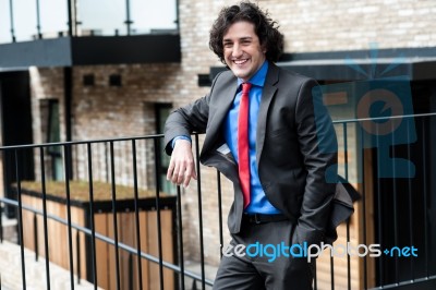 Smart Male Professional Posing Casually, Outdoors Stock Photo