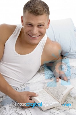 Smart Male Reading Book Stock Photo