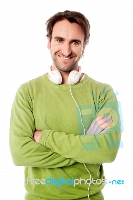 Smart Male With Headphones Around His Neck Stock Photo