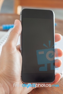 Smart Phone In A Woman's Hand Stock Photo