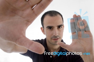 Smart Pose Of Young Guy With Open Palms Stock Photo