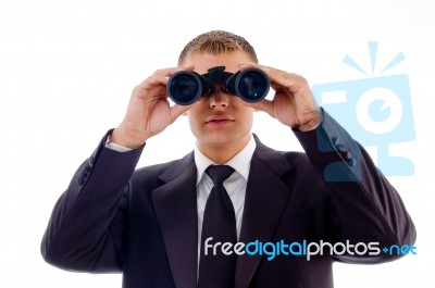 Smart Young Lawyer Viewing Through Binoculars Stock Photo