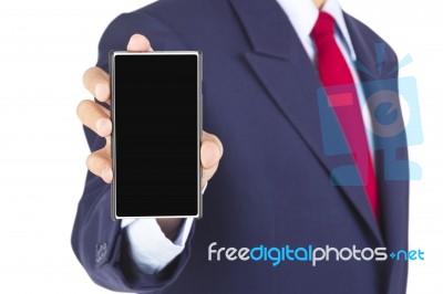 Smartphone On Businessman Hand Stock Photo