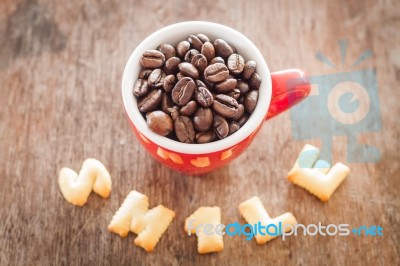 Smile Alphabet Biscuit With Red Coffee Cup Stock Photo