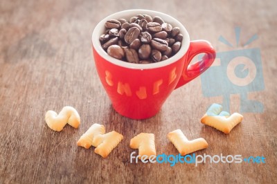 Smile Alphabet Biscuit With Red Coffee Cup Stock Photo