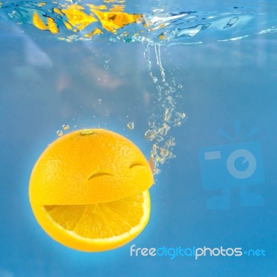 Smile Orange In Water Stock Photo