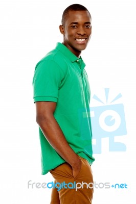 Smiling African Guy Standing Stock Photo