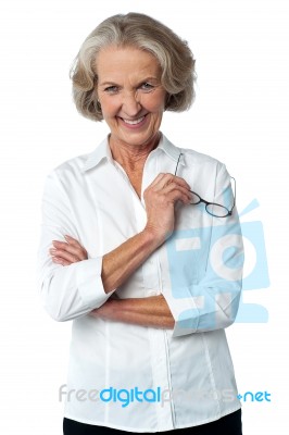 Smiling Aged Woman Looking At You Stock Photo