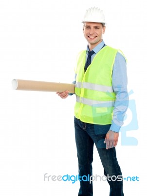 Smiling Architect Holding Blueprint Stock Photo