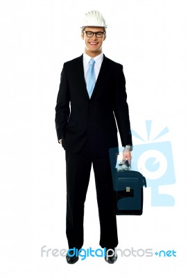 Smiling Architect Holding Briefcase Stock Photo