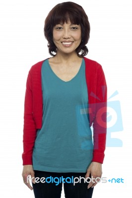 Smiling Asian Woman Standing Stock Photo