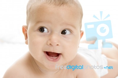 Smiling Baby Lying Stock Photo