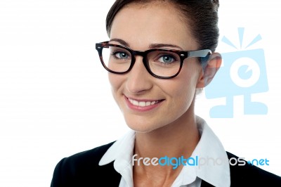 Smiling Bespectacled Corporate Woman Stock Photo