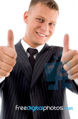 Smiling Boss Showing Thumb Up Stock Photo