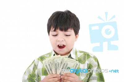 Smiling Boy Counting Money Stock Photo