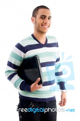 Smiling Boy Holding Laptop Stock Photo