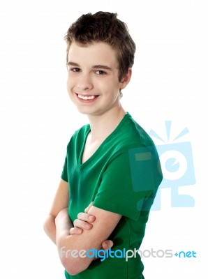 Smiling Boy With crossed Arms Stock Photo