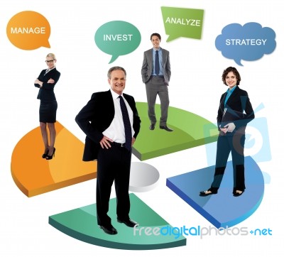 Smiling Business People On Pie Chart Stock Photo