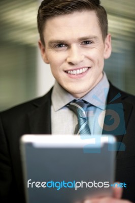 Smiling Businessman With Tablet Pc Stock Photo