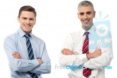 Smiling  Businessmen Posing Together Stock Photo