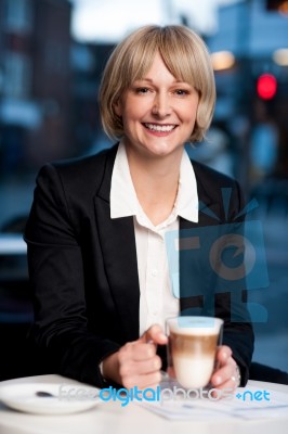 Smiling Businesswoman Having Coffee, Outdoor Stock Photo